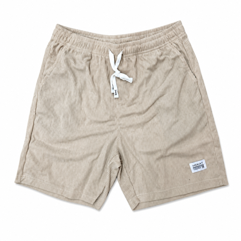 BERMUDA DE MICRO PANA EN TONO BEIGE CON GOMA EN LA CINTURA Y CORDÓN EN CONTRASTE